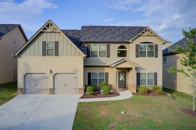 3746 Okefenokee Rdg, Loganville, GA 30052 - craftsman house featuring board and batten siding, driveway, a front lawn, a garage, and stone siding