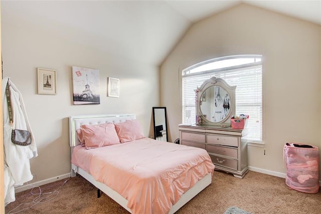 3746 Okefenokee Rdg, Loganville, GA 30052 - bedroom with light colored carpet, vaulted ceiling, and baseboards