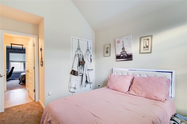 3746 Okefenokee Rdg, Loganville, GA 30052 - bedroom with carpet, vaulted ceiling, a closet, and baseboards