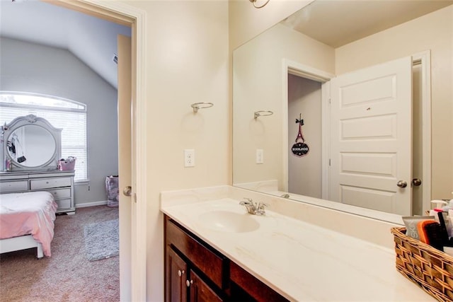 3746 Okefenokee Rdg, Loganville, GA 30052 - bathroom featuring vanity and lofted ceiling