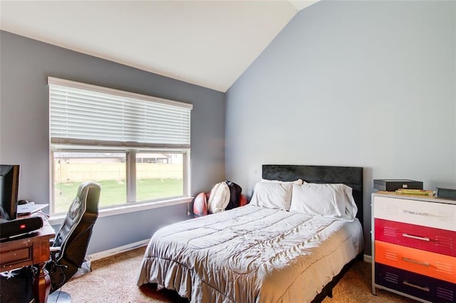 3746 Okefenokee Rdg, Loganville, GA 30052 - carpeted bedroom featuring lofted ceiling, a desk, and baseboards