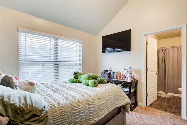 3746 Okefenokee Rdg, Loganville, GA 30052 - bedroom featuring vaulted ceiling, carpet floors, and baseboards