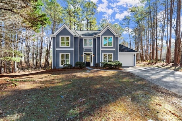 view of front of house with driveway and an attached garage