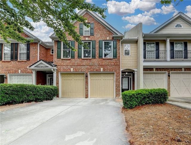 2515 Gadsen Walk, Duluth, GA 30097 - multi unit property featuring driveway, a garage, and brick siding