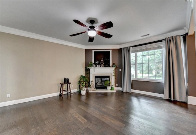 2515 Gadsen Walk, Duluth, GA 30097 - unfurnished living room featuring wood finished floors, a ceiling fan, crown molding, and a glass covered fireplace
