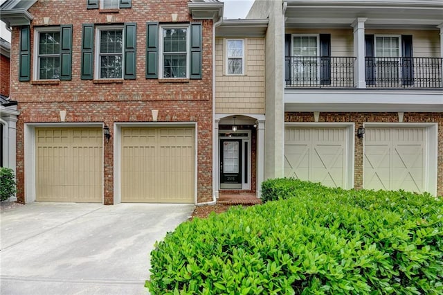 2515 Gadsen Walk, Duluth, GA 30097 - multi unit property featuring driveway, a garage, and brick siding