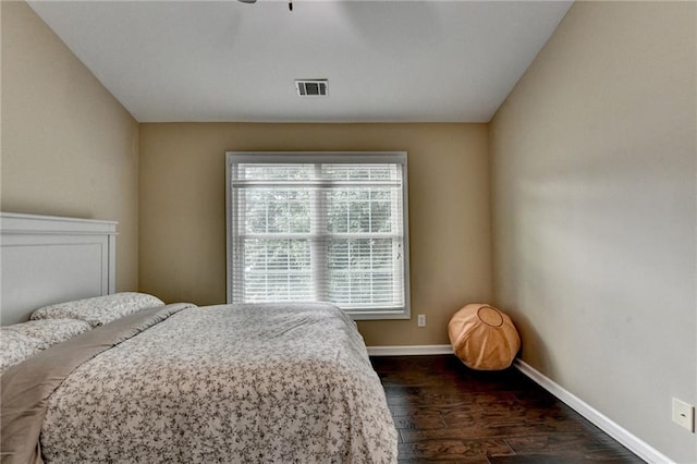 2515 Gadsen Walk, Duluth, GA 30097 - bedroom featuring baseboards and dark wood-type flooring