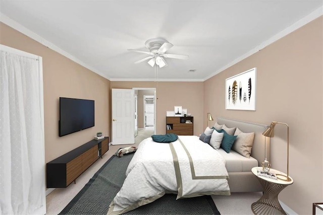 bedroom featuring crown molding, ceiling fan, and light carpet