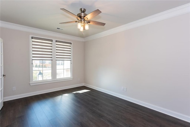 spare room featuring crown molding, dark hardwood / wood-style floors, and ceiling fan