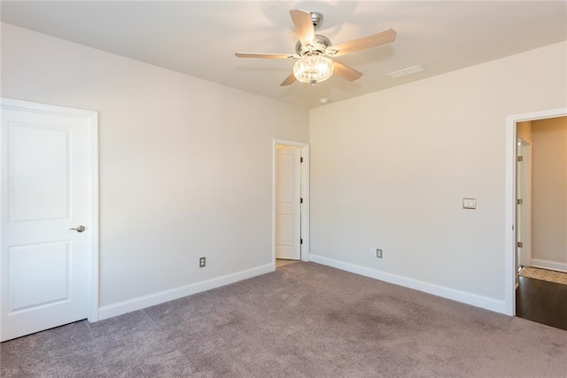 unfurnished room with carpet and ceiling fan