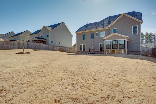 back of house with a patio