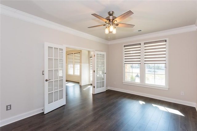 spare room with french doors, ceiling fan, crown molding, and dark wood-type flooring