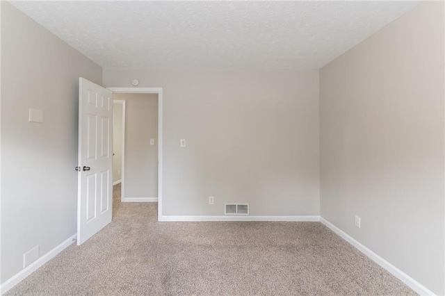 803 Cedar Lake Dr SE, Conyers, GA 30094 - carpeted spare room with a textured ceiling and baseboards