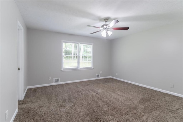 803 Cedar Lake Dr SE, Conyers, GA 30094 - unfurnished room with carpet flooring, a ceiling fan, and baseboards