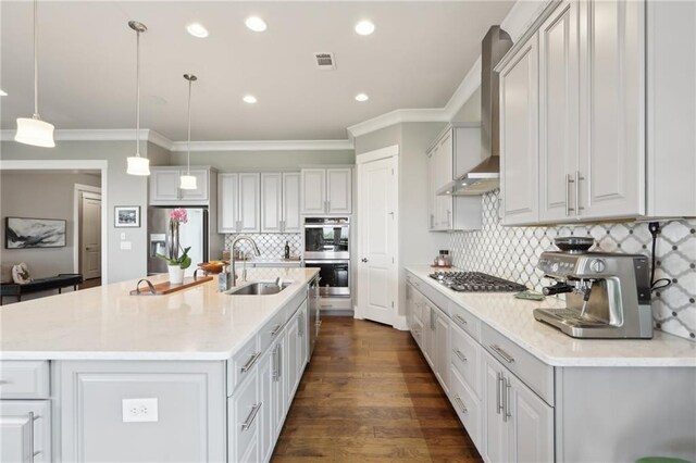 dining area with baseboards, ornamental molding, a notable chandelier, and hardwood / wood-style flooring