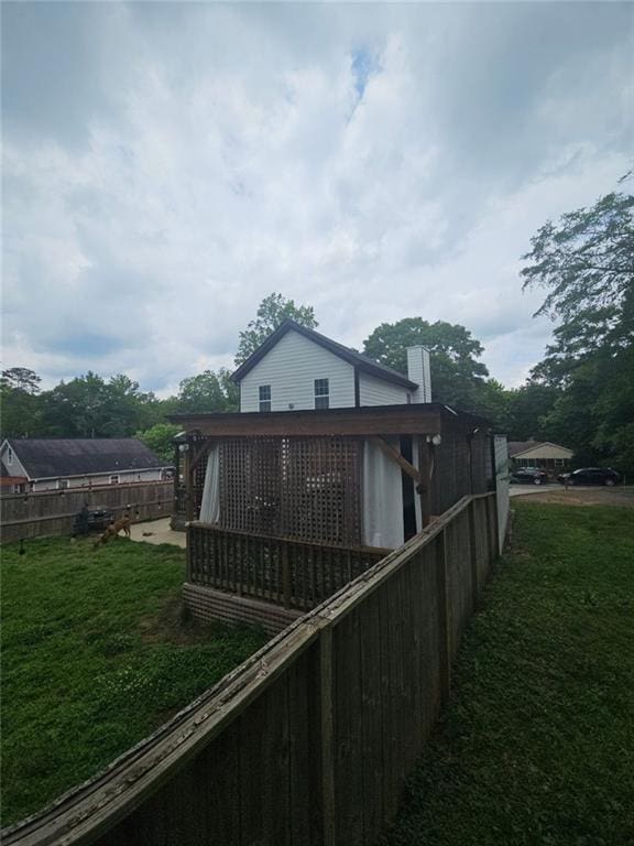 1228 Ladd St SW, Atlanta, GA 30310 - rear view of property with a chimney