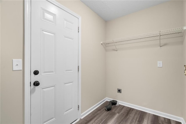 201 Rustin Dr, Dallas, GA 30157 - laundry room with laundry area, baseboards, hookup for an electric dryer, and dark wood-style floors