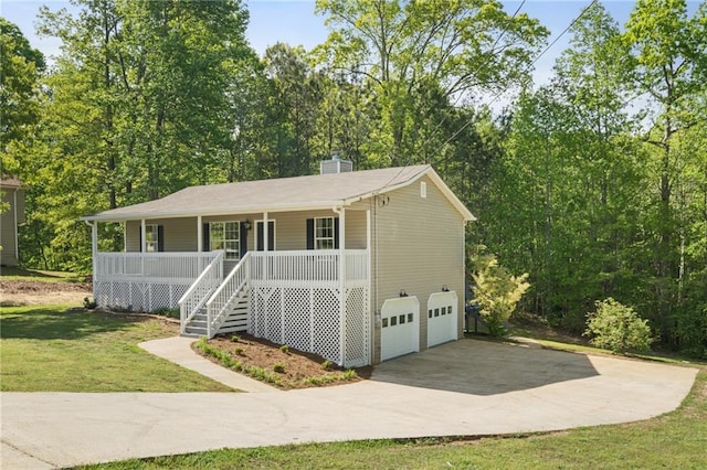 201 Rustin Dr, Dallas, GA 30157 - view of front of house featuring a porch, a chimney, a front yard, concrete driveway, and stairs