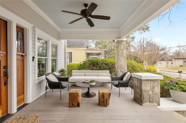 view of patio with ceiling fan, covered porch, and an outdoor living space