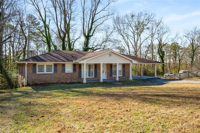 single story home featuring a porch and a front yard