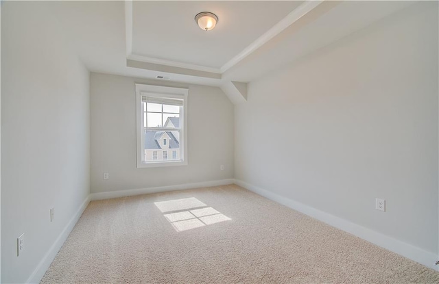 additional living space featuring visible vents, baseboards, and carpet flooring