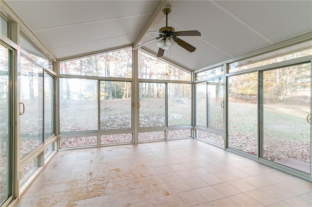 unfurnished sunroom featuring ceiling fan and lofted ceiling