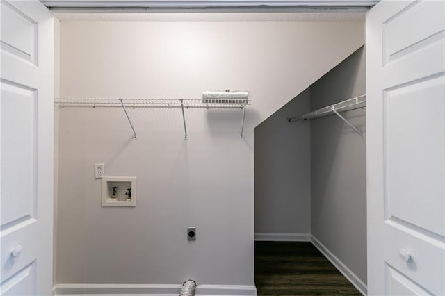 laundry area with hookup for an electric dryer, dark hardwood / wood-style floors, and hookup for a washing machine