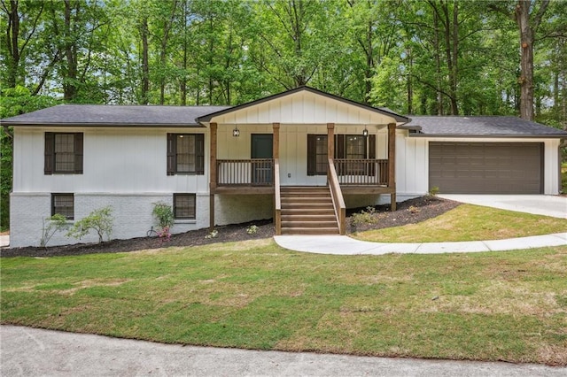 3455 Broxton Mill Way, Snellville, GA 30039 - ranch-style home with a garage, a porch, stairway, a front yard, and concrete driveway