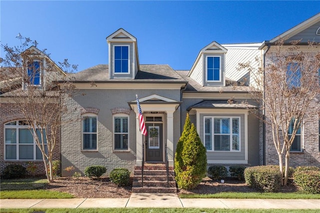 view of front of property with brick siding