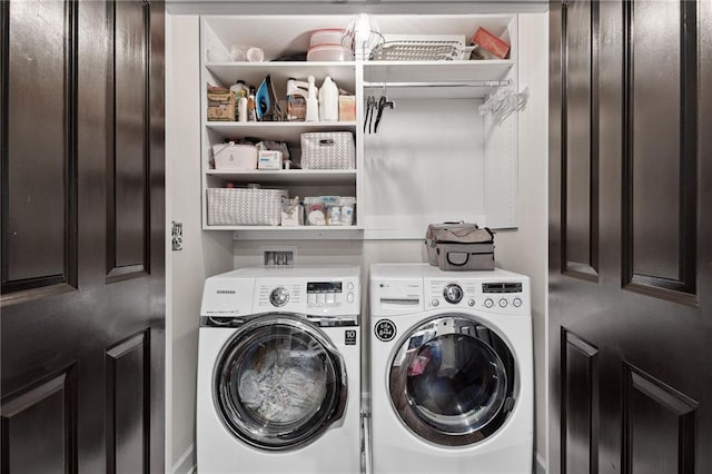 laundry area with laundry area and washer and dryer