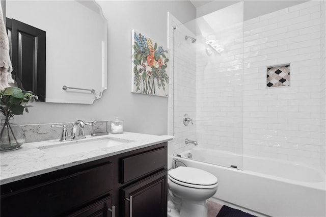 full bath featuring shower / bath combination, toilet, and vanity