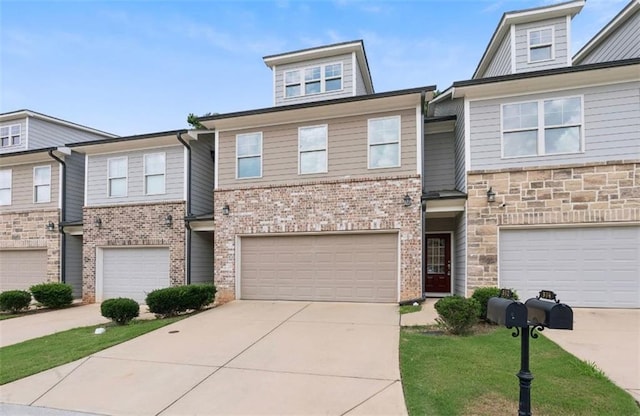 382 Mulberry Row SE, Atlanta, GA 30354 - multi unit property with concrete driveway, brick siding, and a garage
