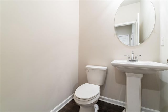 382 Mulberry Row SE, Atlanta, GA 30354 - bathroom featuring baseboards and wood finished floors