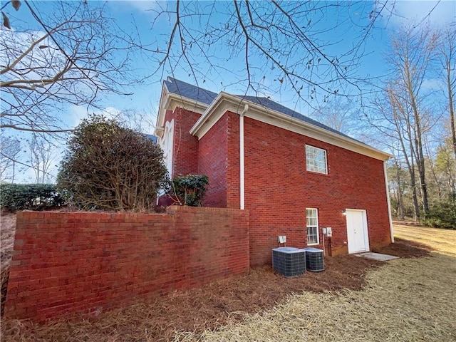 view of property exterior with central air condition unit