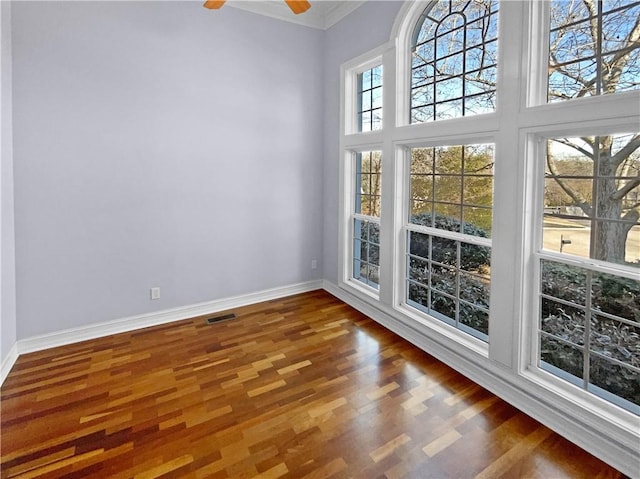 interior space with ceiling fan