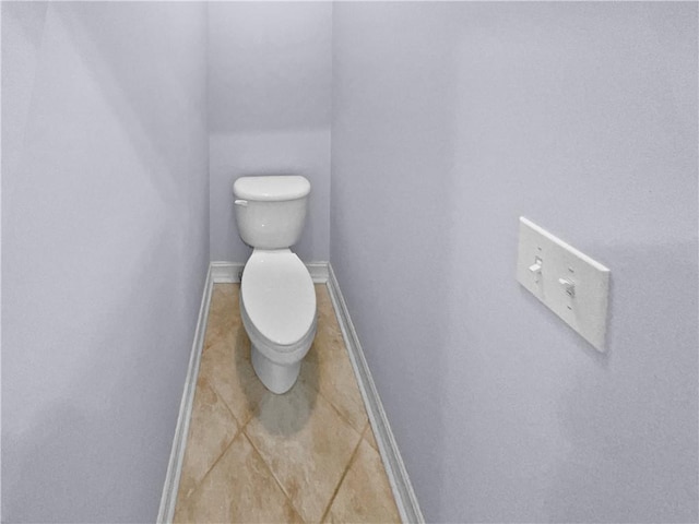 bathroom featuring toilet