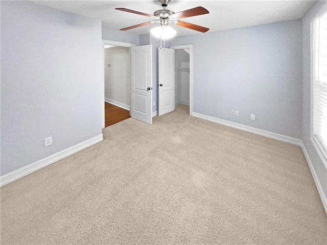 interior space featuring a wealth of natural light and ceiling fan