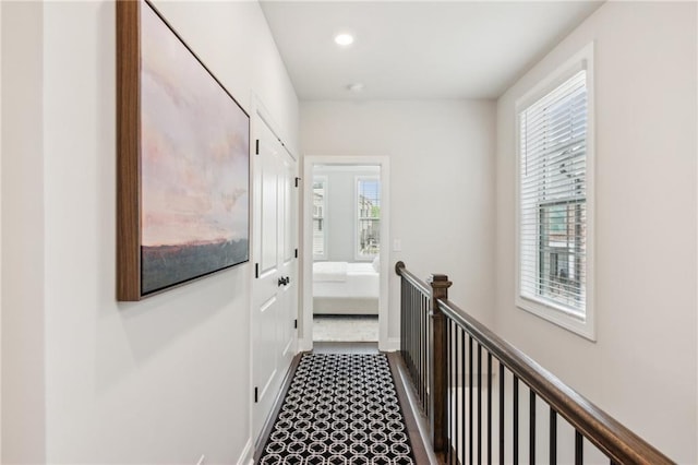 427 Burton Dr, Alpharetta, GA 30009 - hall featuring plenty of natural light, an upstairs landing, recessed lighting, baseboards, and dark flooring