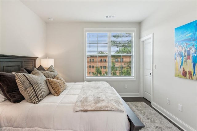 427 Burton Dr, Alpharetta, GA 30009 - bedroom featuring baseboards and wood finished floors