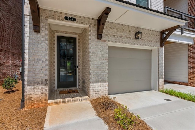427 Burton Dr, Alpharetta, GA 30009 - doorway to property with brick siding, concrete driveway, and an attached garage