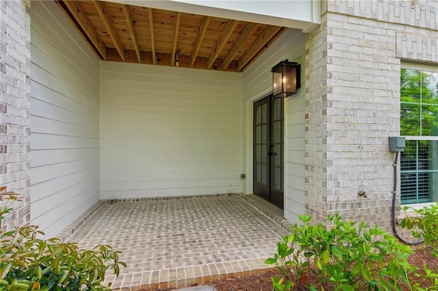 427 Burton Dr, Alpharetta, GA 30009 - view of exterior entry with brick siding and french doors