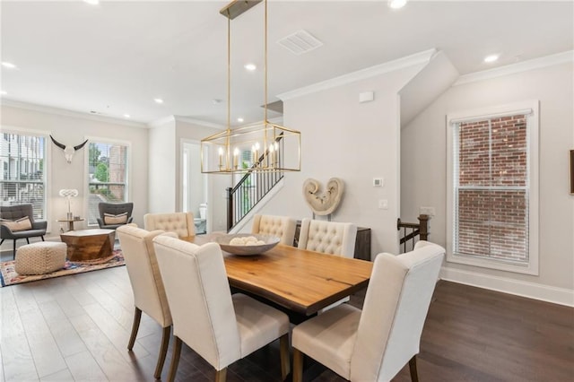 427 Burton Dr, Alpharetta, GA 30009 - dining room with crown molding, dark wood-type flooring, recessed lighting, a chandelier, and baseboards