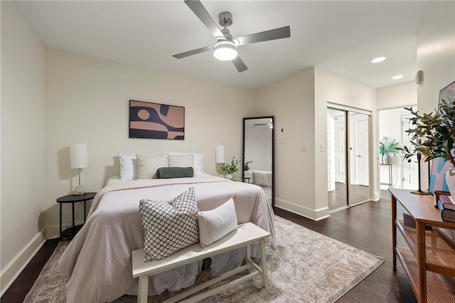 bedroom featuring dark hardwood / wood-style floors and ceiling fan