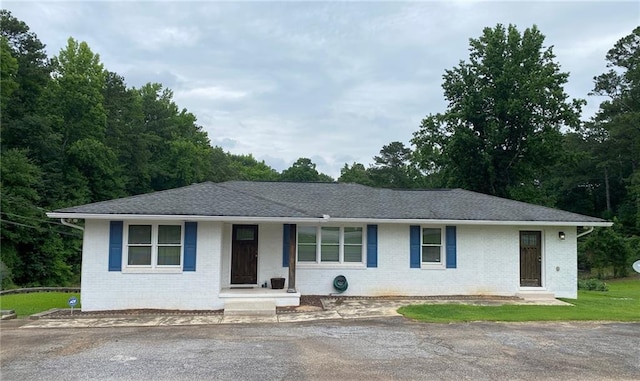 410 S Gordon Rd SW, Mableton, GA 30126 - ranch-style house featuring brick siding, a porch, and roof with shingles