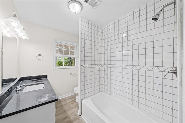 9 Latimer Rd, Cartersville, GA 30121 - full bath with vanity, toilet, wood finished floors, tub / shower combination, and baseboards