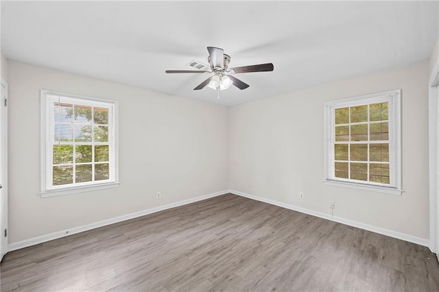 9 Latimer Rd, Cartersville, GA 30121 - empty room with wood finished floors, a ceiling fan, and baseboards