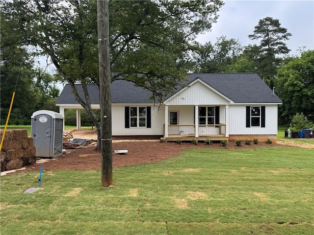 304 Cash Town Rd, Aragon, GA 30104 - view of front of property featuring covered porch, roof with shingles, a front yard, and a carport