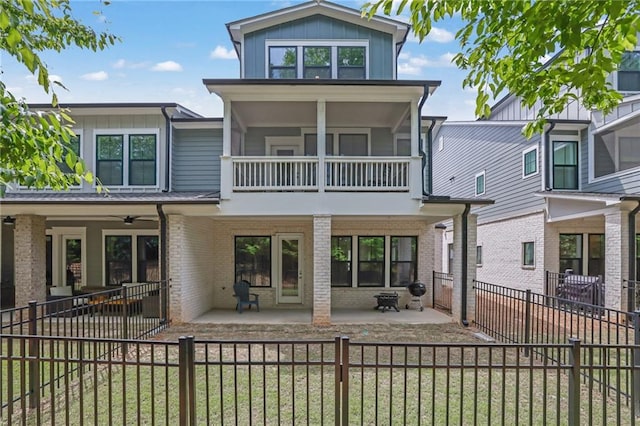 1110 Harper Dr, Roswell, GA 30076 - rear view of property with brick siding, a fenced backyard, a balcony, and a patio area