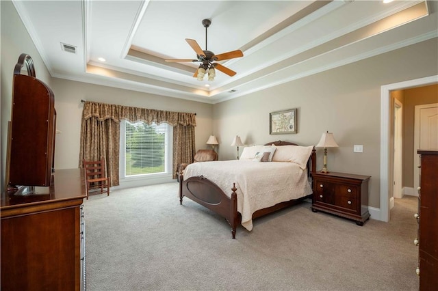 815 Spring View Ct, Covington, GA 30014 - bedroom featuring light colored carpet, a tray ceiling, ornamental molding, ceiling fan, and baseboards