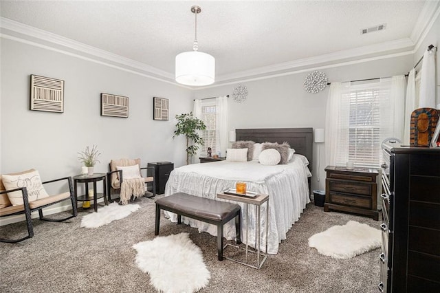 carpeted bedroom with multiple windows and crown molding